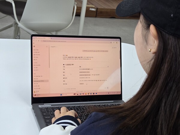 A student uses AI tools like ChatGPT to assist with coursework.